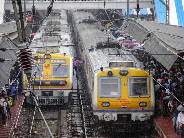 Paperless Unreserved Ticketing through Mobile Phones