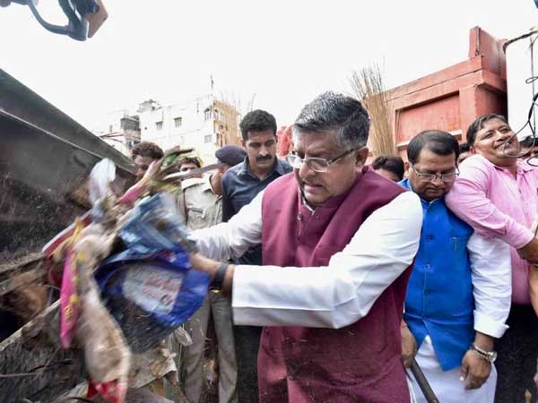 Ravi Shankar Prasad cleans Patna's Mithapur area