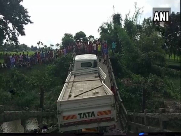 Bridge caved in while truck was crossing it