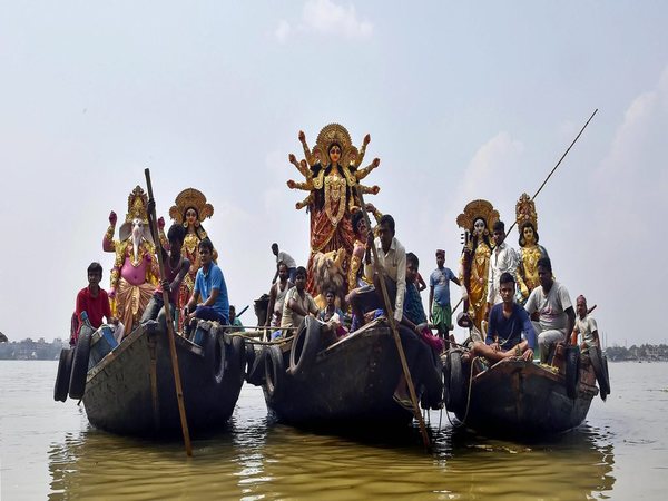 People carrying the idols of Durga