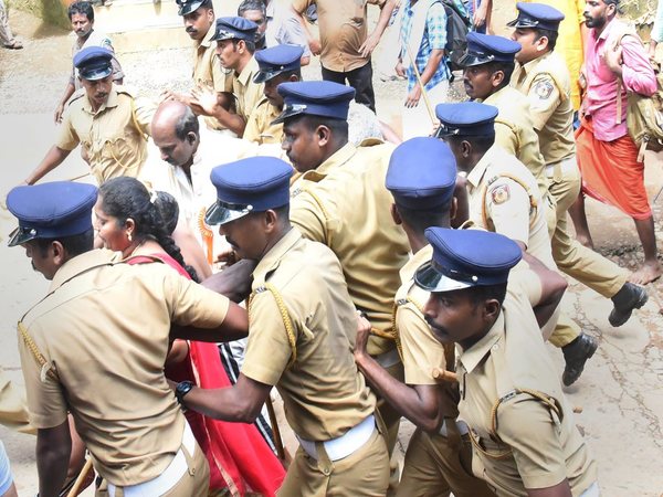 Police escort Madhavi 