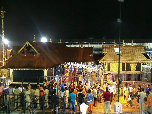 Devotees pay obeisance Lord Ayyappa temple in Sabarimala
