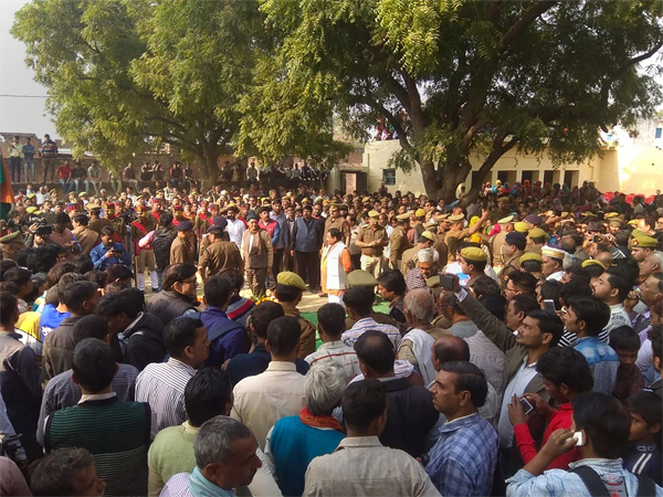 People gather to pay their last respects to Police Inspector Subodh Kumar Singh, during his funeral ceremony in Etah People gather to pay their last respects to Police Inspector Subodh Kumar Singh, during his funeral ceremony in Etah