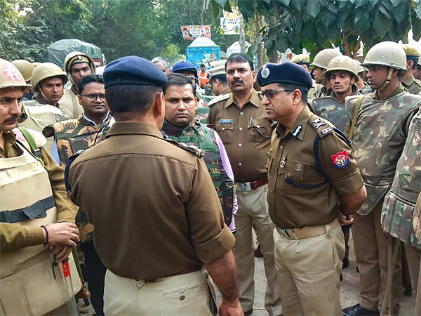 Policemen stand guard