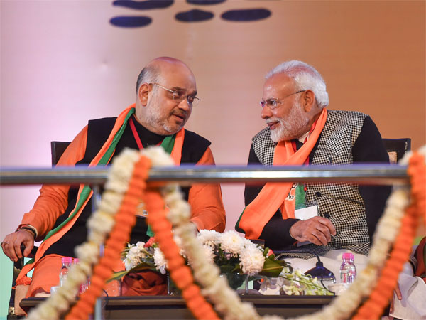 Prime Minister Narendra Modi with BJP National President Amit Shah, on the first day of BJP National Executive Meet, at Ramlila Maidan in New Delhi Prime Minister Narendra Modi with BJP National President Amit Shah, on the first day of BJP National Executive Meet, at Ramlila Maidan in New Delhi