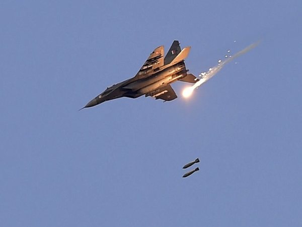 An Indian Air Force (IAF) MIG 29 releases bombs during an IAF exercise named ,