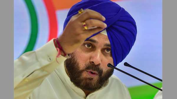 Why hasnt Sidhu taken charge of new ministry? His spat with Captain hurting Cong in Punjab Why hasnt Sidhu taken charge of new ministry? His spat with Captain hurting Cong in Punjab