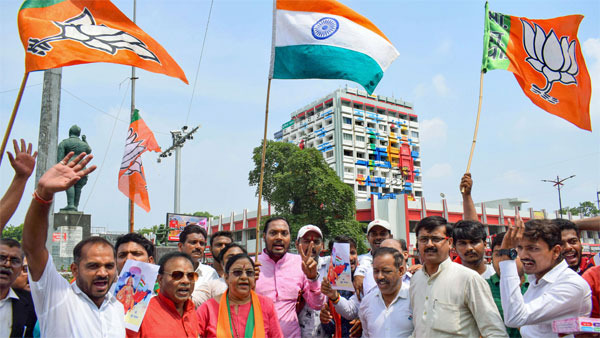Bharatiya Janata Party workers celebrate governments decision to abolish Article 370 that gave special status to Jammu and Kashmir Bharatiya Janata Party workers celebrate governments decision to abolish Article 370 that gave special status to Jammu and Kashmir
