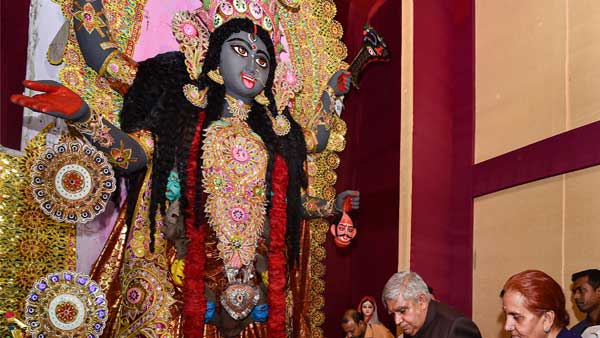 Bengal guv Dhankhar attends Kali Puja