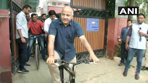 Manish Sisodia seen cycling to work