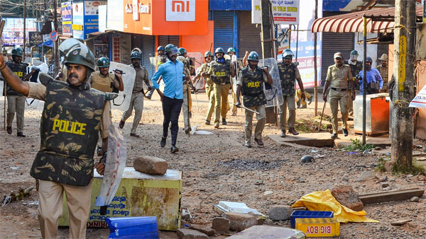 Police personnel and protestors clash during a rally against the amended Citizenship Act and NRC, in Mangaluru Police personnel and protestors clash during a rally against the amended Citizenship Act and NRC, in Mangaluru