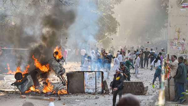 Vehicles set ablaze as protestors throw brick-bats during clashes between a group of anti-CAA protestors and supporters of the new citizenship act, at Jafrabad in north-east Delhi Vehicles set ablaze as protestors throw brick-bats during clashes between a group of anti-CAA protestors and supporters of the new citizenship act, at Jafrabad in north-east Delhi