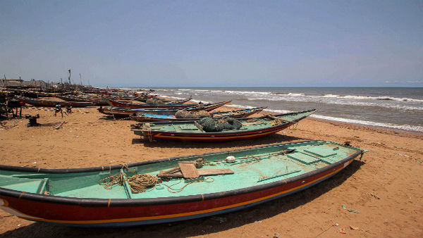 Fishing boats anchored at the Puri beach after authorities warned fishermen not to venture into the sea in the view of Cyclone Amphan, at Konark in Puri district