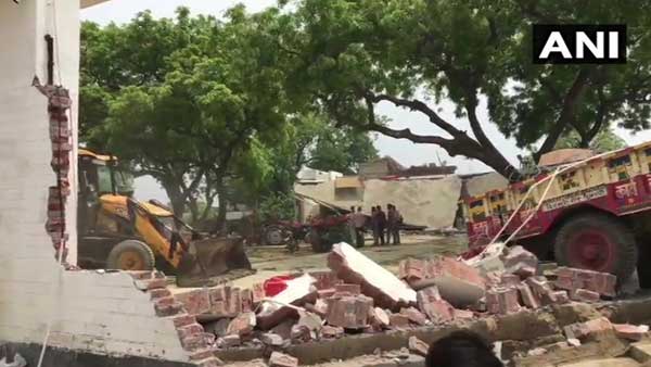 Bulldozer mows down history sheeter Vikas Dubey’s house, police find underground bunker Bulldozer mows down history sheeter Vikas Dubey’s house, police find underground bunker