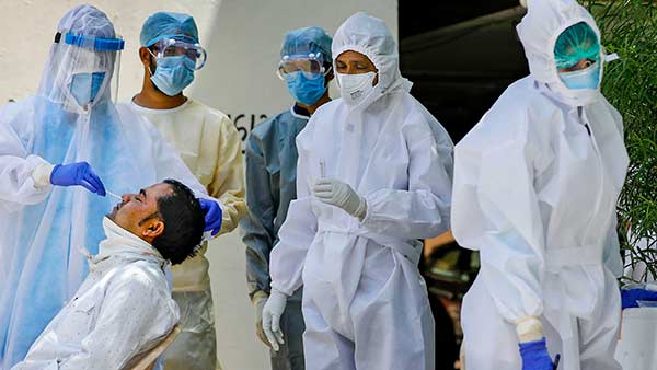 US sets coronavirus infection record; deaths near 224,000 US sets coronavirus infection record; deaths near 224,000