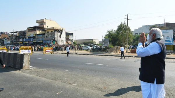 PM Modi greets people PM Modi greets people