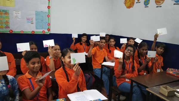 Pause, listen, approach: How Slam Out Loud is helping scores of students during the pandemic