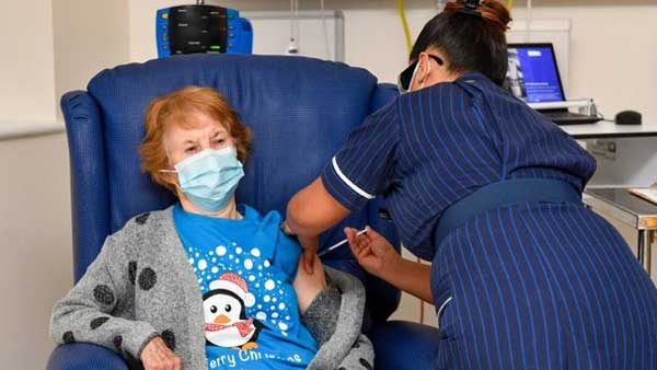 90 year old lady is first person in the world to receive Pfizer COVID-19 vaccine in UK 90 year old lady is first person in the world to receive Pfizer COVID-19 vaccine in UK