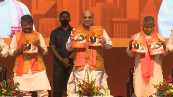 Amit Shah releases BJP manifesto for West Bengal polls Amit Shah releases BJP manifesto for West Bengal polls