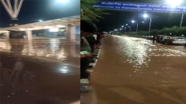 Watch: Heavy rains leads to waterlogging outside Kempegowda International Airport in Bengaluru Watch: Heavy rains leads to waterlogging outside Kempegowda International Airport in Bengaluru