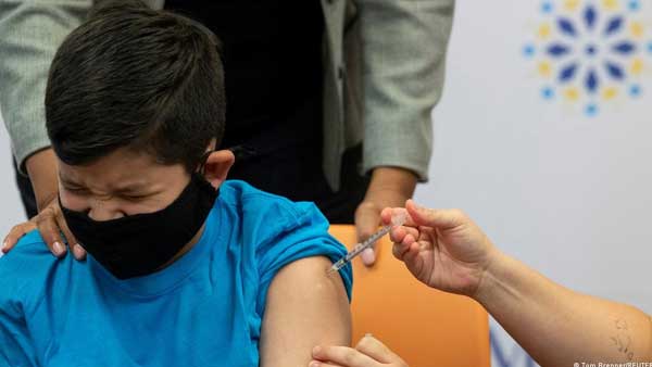 US parents split over COVID vaccines for young kids