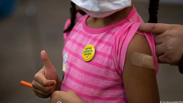 US parents split over COVID vaccines for young kids