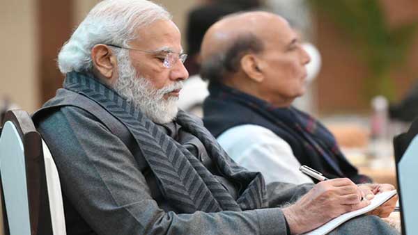 PM Modi taking notes 