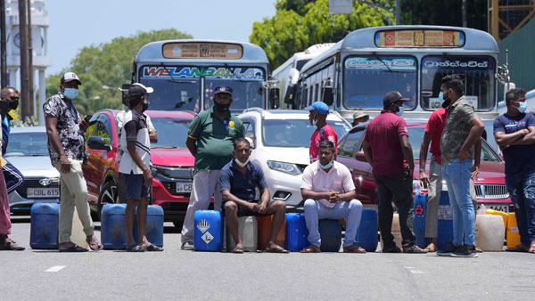 Police fired tear gas and water cannons at angry protesters on Thursday after they gathered in front of the Sri Lankan President Gotabaya Rajapaksas residence on Thursday clamouring for his resignation, as the island nation continued to reel under its worst economic crisis in decades, PTI reported. Police fired tear gas and water cannons at angry protesters on Thursday after they gathered in front of the Sri Lankan President Gotabaya Rajapaksas residence on Thursday clamouring for his resignation, as the island nation continued to reel under its worst economic crisis in decades, PTI reported.
