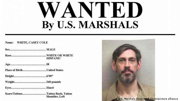 US: On-the-run officer dies, fugitive caught