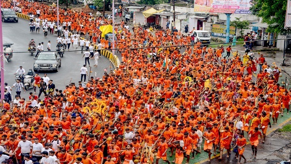Kanwariyas pass through a street in Jabalpur
