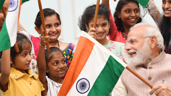 In Pics: PM Modi gives Tiranga to every child to mark Har Ghar Tiranga campaign