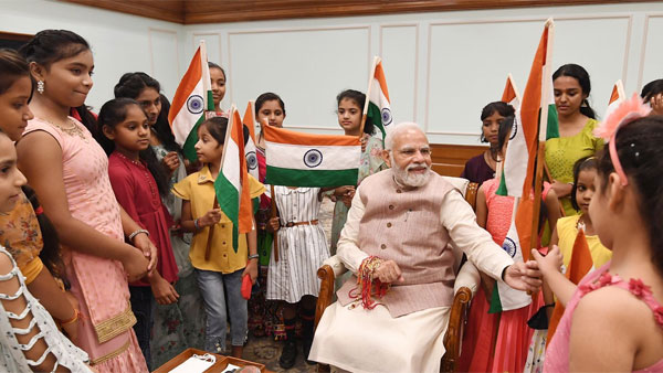 In Pics: PM Modi gives Tiranga to every child to mark Har Ghar Tiranga campaign