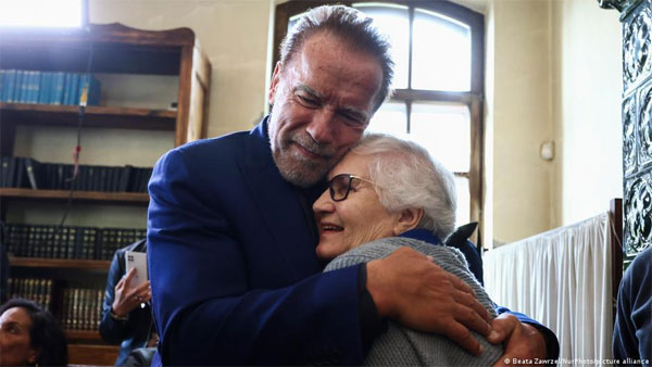 Schwarzenegger visits Auschwitz to fight hate