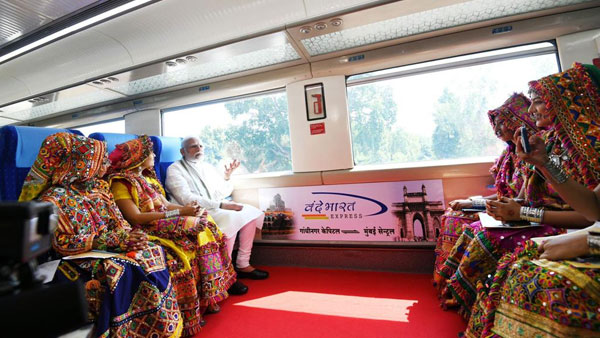 PM Modi buys first ticket of Gandhinagar-Mumbai Vande Bharat train | See pics