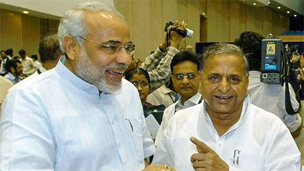 PM Modi (then Gujarat CM with Yadav) 