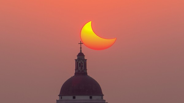 Stargazers spellbound as partial eclipse arcs across India 