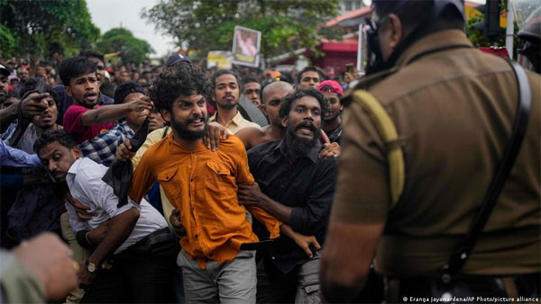 Struggling Sri Lanka limits presidents powers