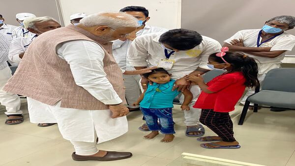 PM Modi meets Morbi victims family