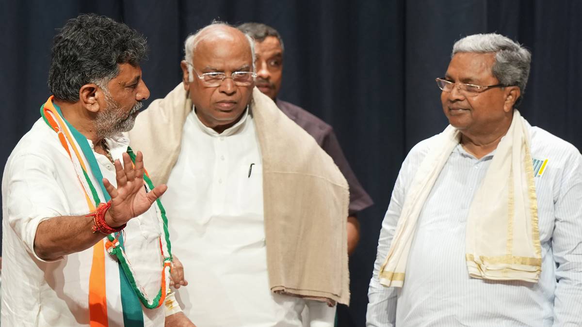 Congress President Mallikarjun Kharge with former Karnataka CM Siddaramaiah and Karnataka Congress President D.K. Shivakumar during celebrations after the partys win in Karnataka Assembly elections. Congress President Mallikarjun Kharge with former Karnataka CM Siddaramaiah and Karnataka Congress President D.K. Shivakumar during celebrations after the partys win in Karnataka Assembly elections.