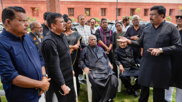 AAP MP Sanjay Singh with Leader of Opposition in Rajya Sabha Mallikarjun Kharge and other opposition MPs during a protest over the former’s suspension from Rajya Sabha, at Parliament House complex amid the Monsoon session, in New Delhi AAP MP Sanjay Singh with Leader of Opposition in Rajya Sabha Mallikarjun Kharge and other opposition MPs during a protest over the former’s suspension from Rajya Sabha, at Parliament House complex amid the Monsoon session, in New Delhi