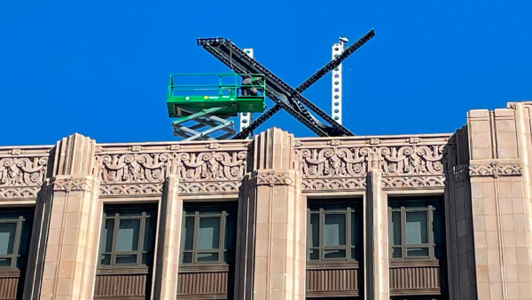 A large, metal X sign is seen on top of the downtown building that housed what was once Twitter, now rebranded by its owner, Elon Musk, in San Francisco