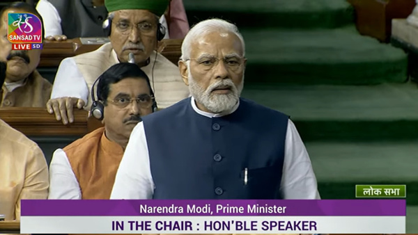 Prime Minister Narendra Modi replies on the Motion of No-Confidence in the Lok Sabha in the Monsoon session of Parliament, in New Delhi