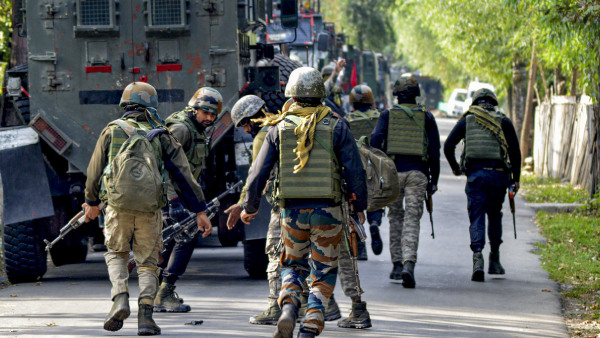 Security personnel during an encounter with terrorists at Gadole area of Kokernag, in Anantnag district