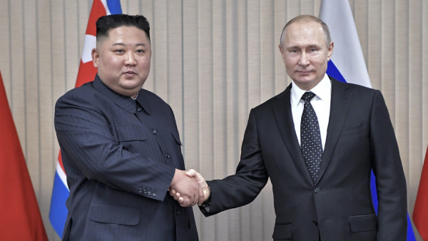 Russian President Vladimir Putin with North Koreas leader Kim Jong Un