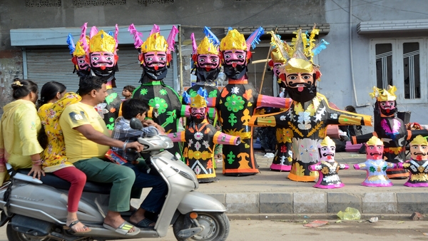 Effigies of Hindu demon King Ravana at a street stall to be sold ahead of the Dussehra festival (PTI Photo)