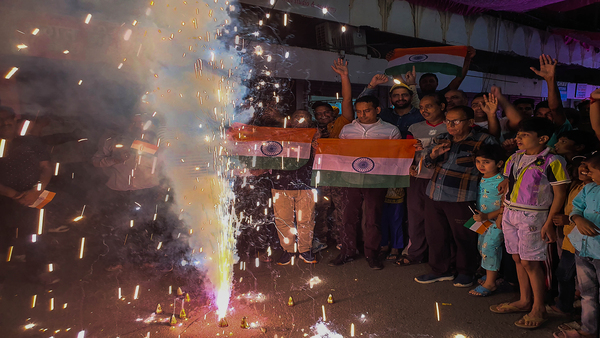 People celebrate after India won the ICC Mens Cricket World Cup 2023 match against Pakistan (PTI Photo)