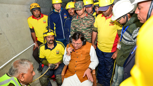 ttarakhand Chief Minister Pushkar Singh Dhami talks with workers trapped inside the under-construction tunnel between Silkyara and Dandalgaon on the Brahmakhal-Yamunotri national highway, in Uttarkashi district ttarakhand Chief Minister Pushkar Singh Dhami talks with workers trapped inside the under-construction tunnel between Silkyara and Dandalgaon on the Brahmakhal-Yamunotri national highway, in Uttarkashi district
