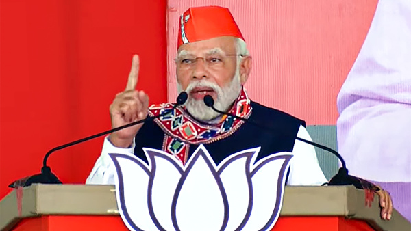 Prime Minister Narendra Modi addresses a public meeting ahead of the Telangana Assembly election, in Mahabubabad