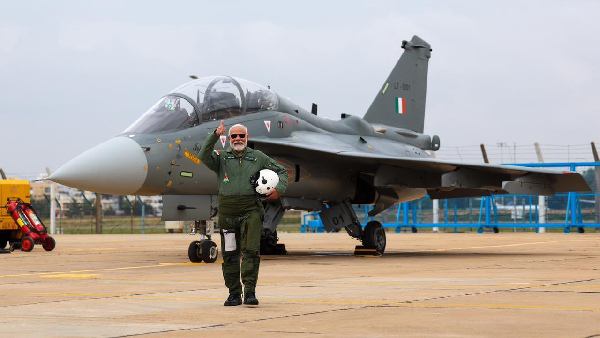 In Pics: PM Modi Takes To The Skies In Tejas Fighter During HAL Visit In Bengaluru