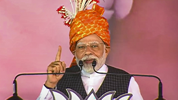 Prime Minister Narendra Modi addresses during a public meeting for Chhattisgarh Assembly elections, in Bishrampur, Surajpur district Prime Minister Narendra Modi addresses during a public meeting for Chhattisgarh Assembly elections, in Bishrampur, Surajpur district